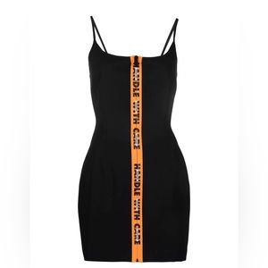 Black Heron Preston dress.